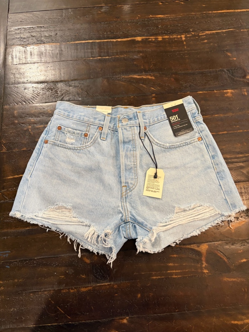 Levi's 501 High-Rise Light Blue Distressed Denim Shorts
